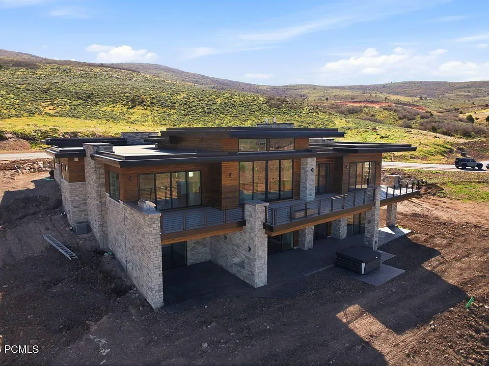 Modern stone and timber residence overlooking the Wasatch Back